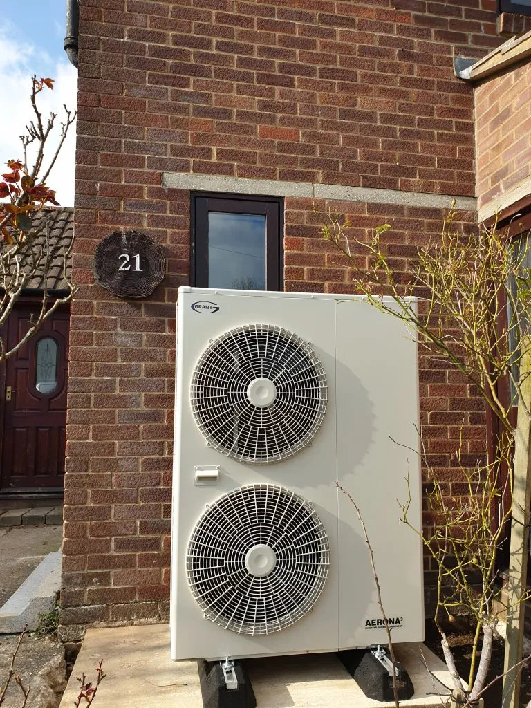 Grant heat pump to the rear of a property.