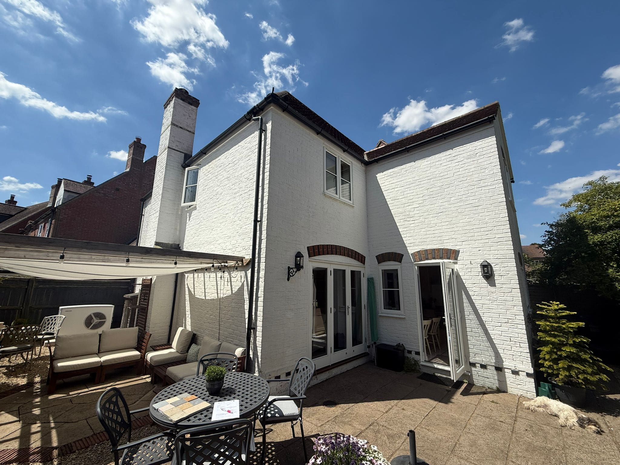 1990's home with new air source heat pump with Humphrey and Crockett